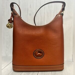 Vintage Dooney & Bourke 1980’s “British Tan”
 All Weather leather Small Hobo Bag